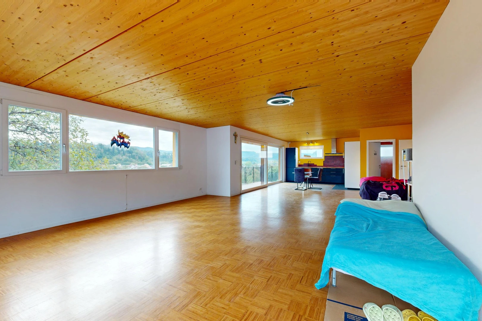 empty room with wooden ceiling, access to outside, parquet flooring, and healthy amount of natural light