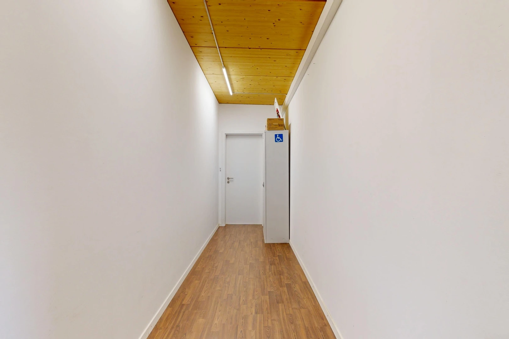 corridor featuring wood ceiling and light wood-style floors