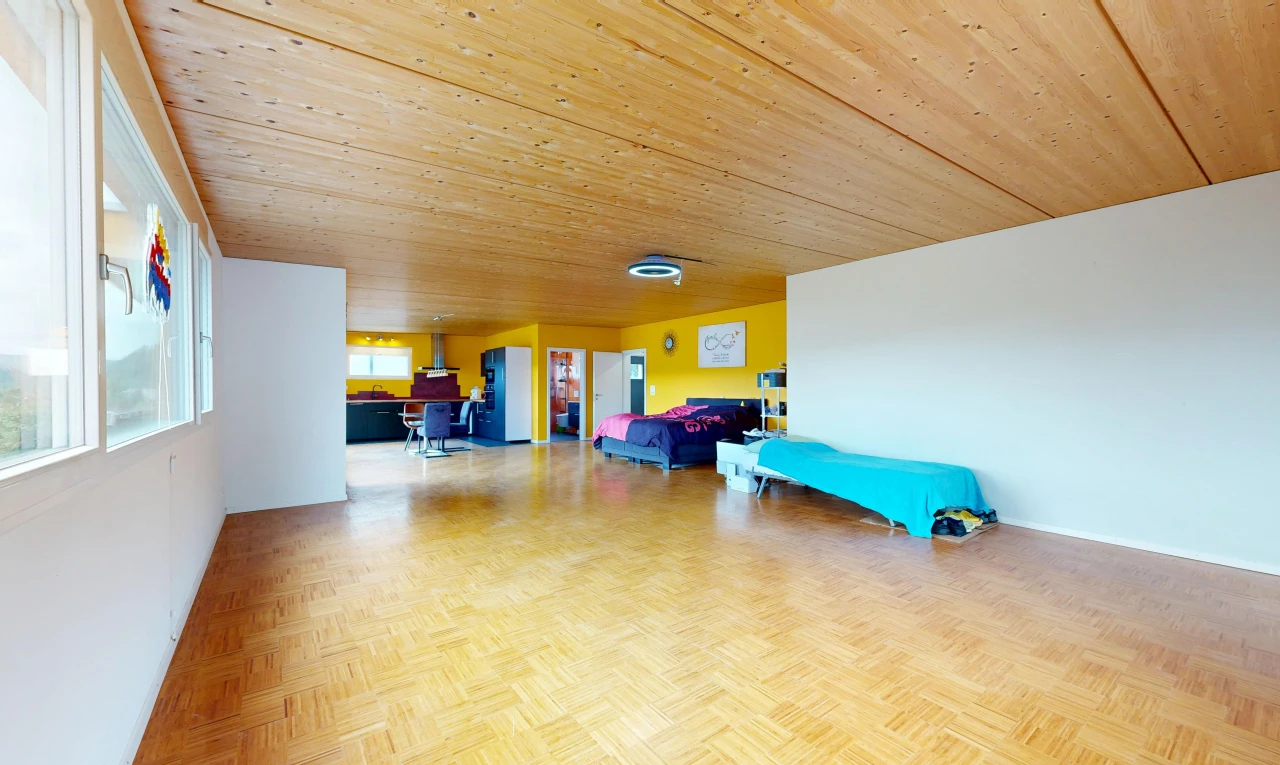 living room with wooden ceiling and parquet floors