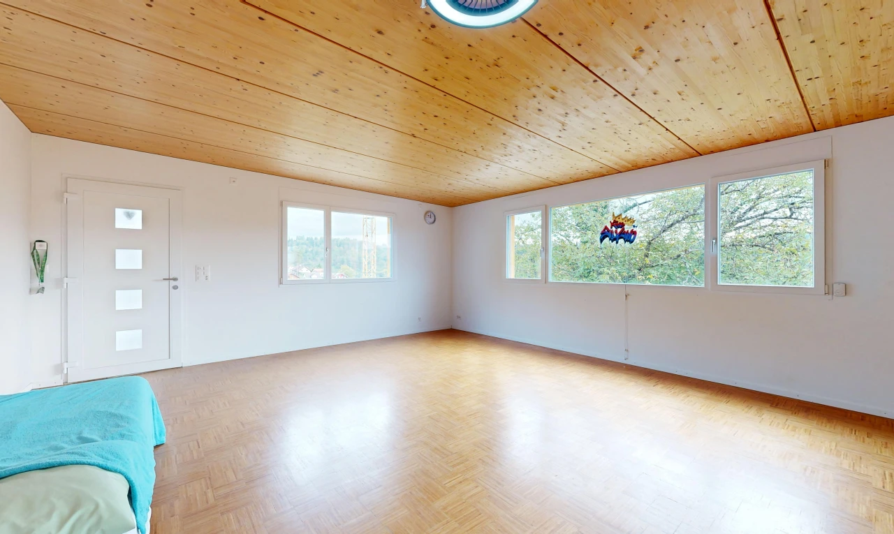 empty room with wooden ceiling, parquet floors, and access to exterior
