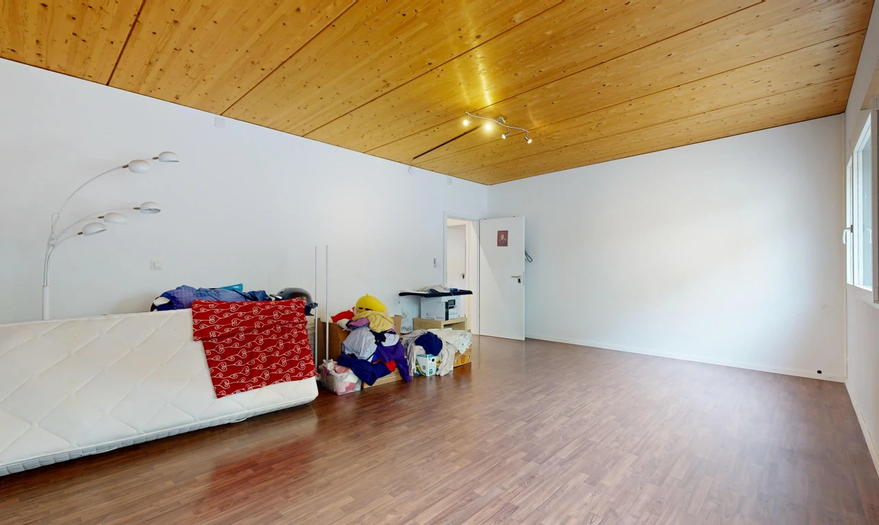 unfurnished room with wooden ceiling, wood finished floors, and track lighting