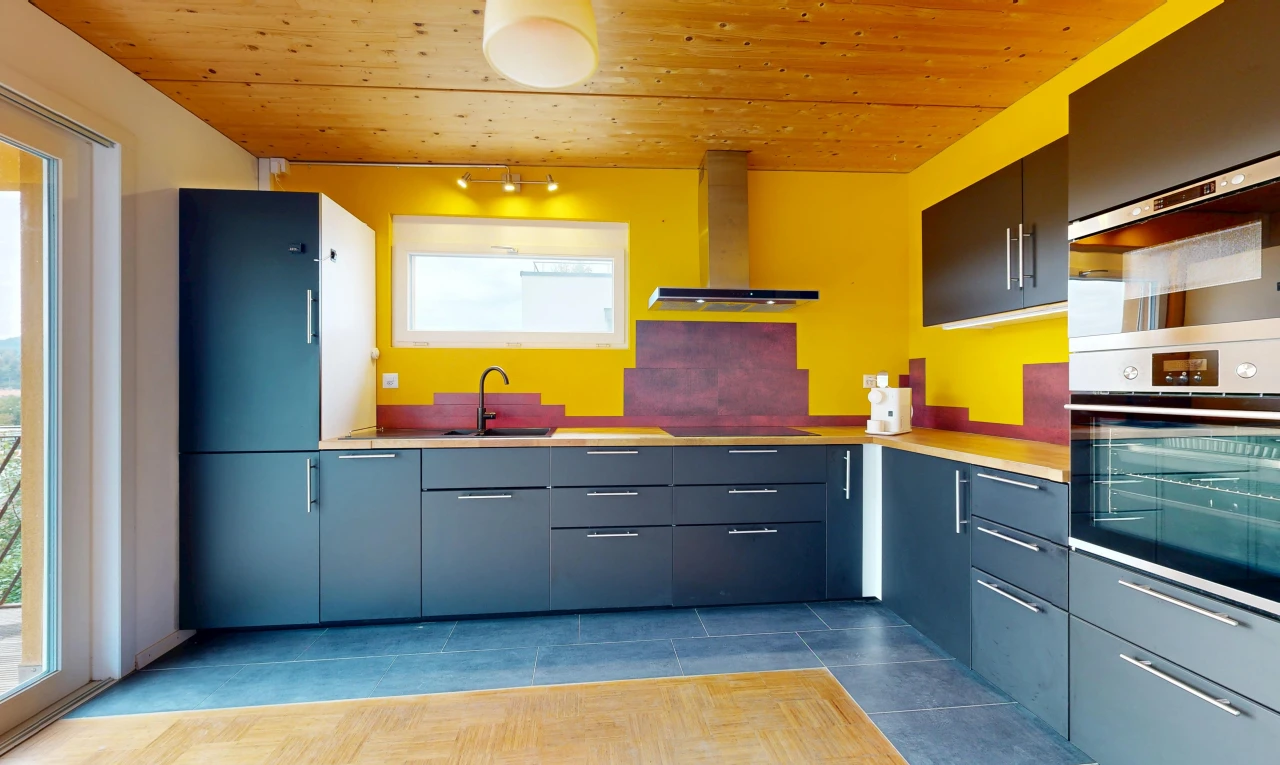 kitchen with wood ceiling, oven, light countertops, and black electric stovetop