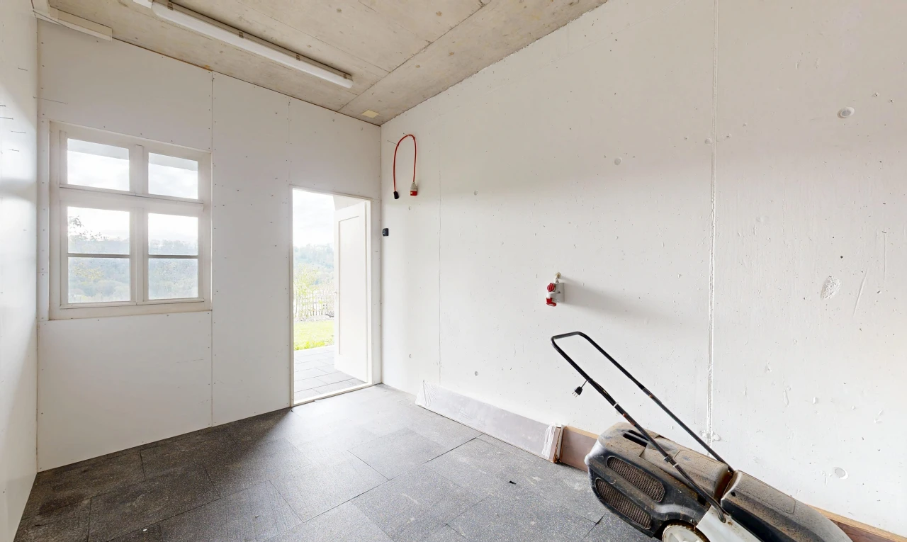 unfurnished room with access to outside