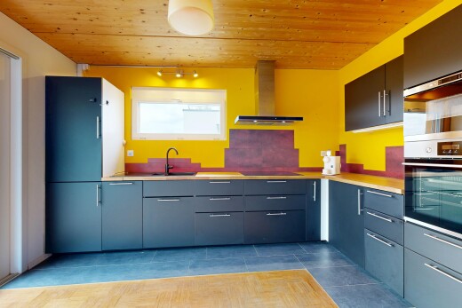 kitchen with wood ceiling, oven, light countertops, and black electric stovetop