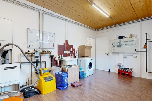 laundry area featuring washer / clothes dryer and a sink