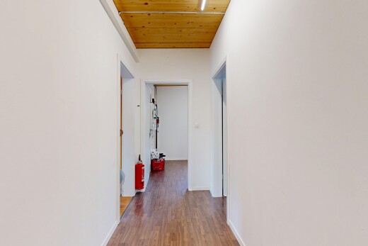 hall featuring wooden ceiling and dark wood-style flooring