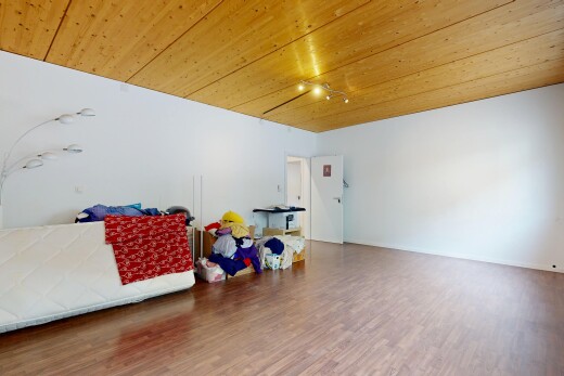 unfurnished room with wooden ceiling, wood finished floors, and track lighting