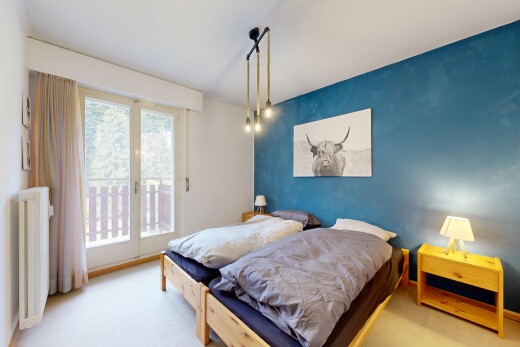chambre avec natural light, lumière naturelle, drywall, cloison sèche, et accès à l'extérieur