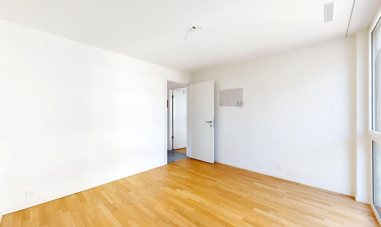 spare room featuring light wood finished floors