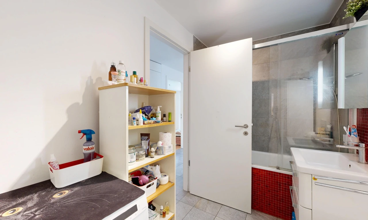 full bath with vanity, shower / bathtub combination, and light tile patterned floors