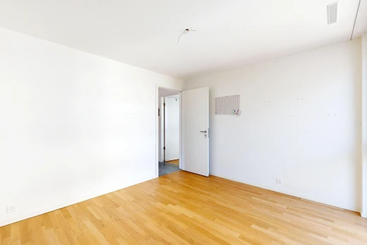 spare room featuring light wood finished floors