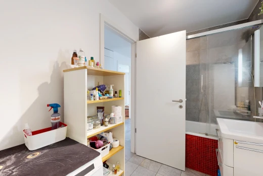full bath with vanity, shower / bathtub combination, and light tile patterned floors