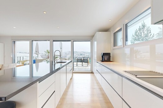 kitchen featuring white cabinetry, modern cabinets, light wood-style floors, and recessed lighting