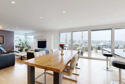 living / dining room with light wood finished floors and recessed lighting