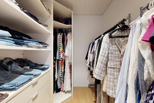 spacious closet featuring light wood-type flooring