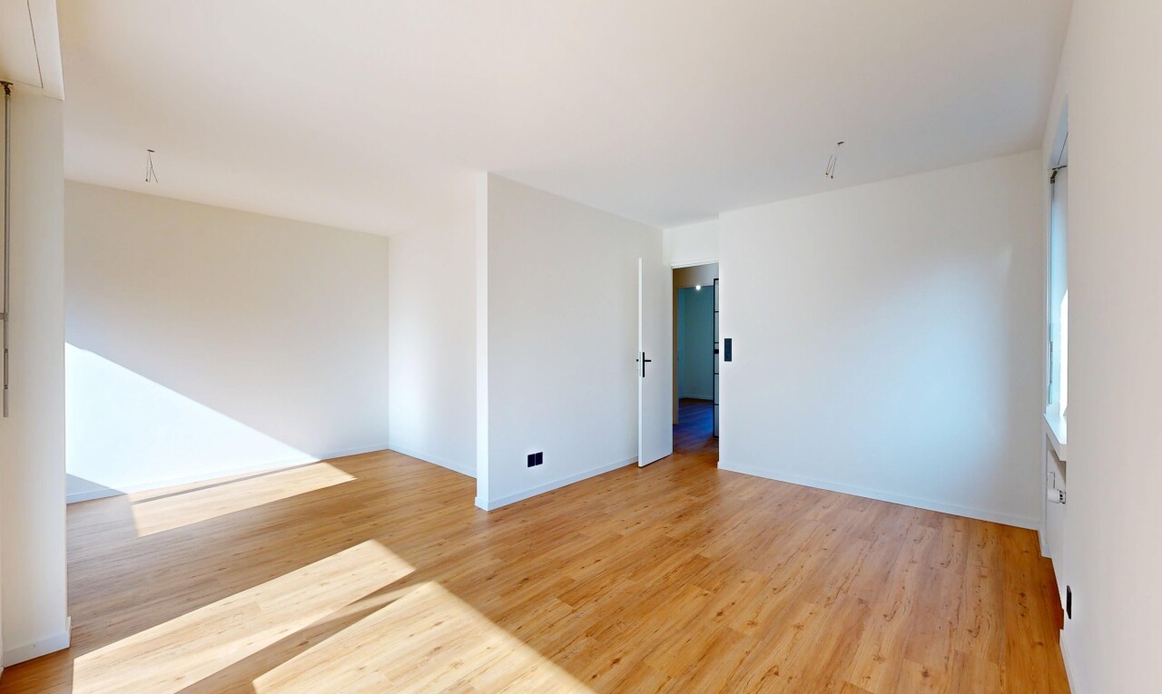spare room featuring light wood-type flooring