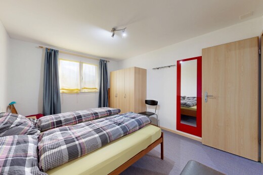 chambre avec cloison sèche, drywall, inside property, moquette, et carpet