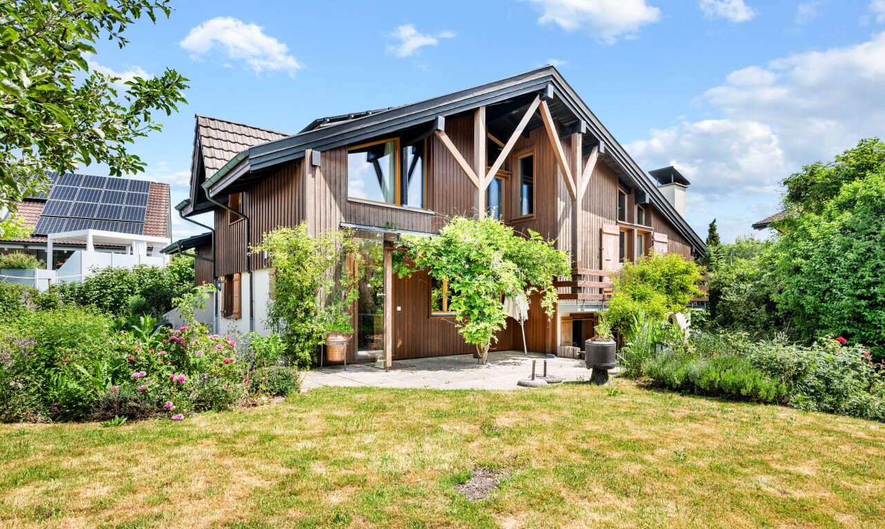view of property with a yard and a patio