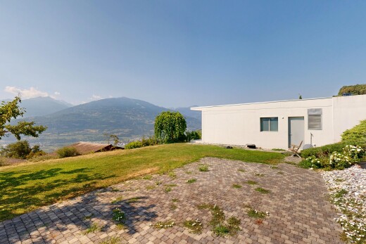 façade avec mountain view, vue sur la montagne, bardage en stuc, day time, et from property