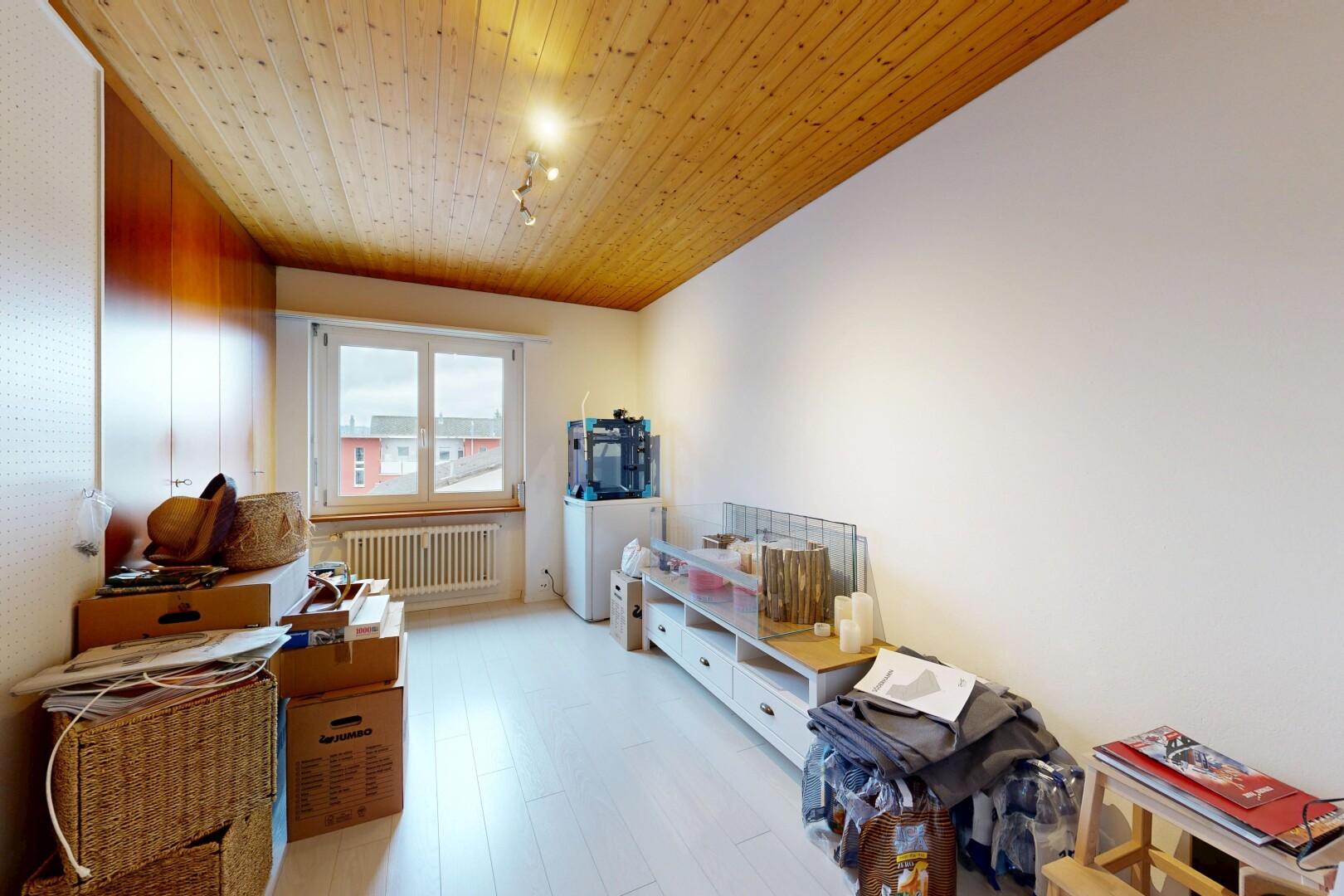 room / bedroom featuring radiator, wood ceiling, and light wood-type flooring