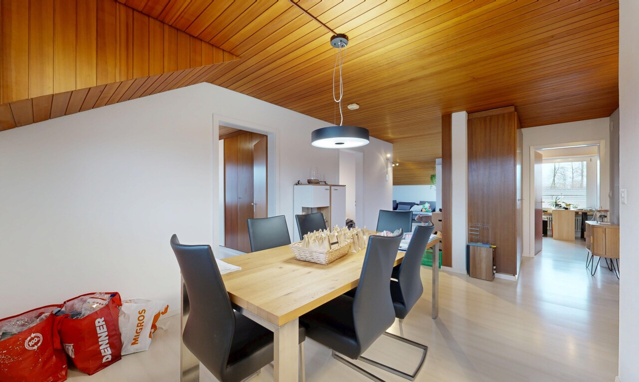 dining room featuring wooden ceiling and light wood-style floors