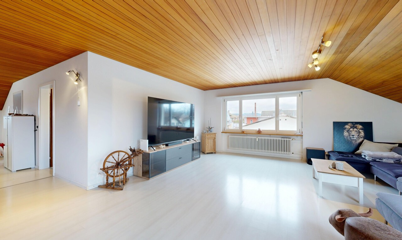 living room with wood ceiling, track lighting, radiator heating unit, wood finished floors, and lofted ceiling