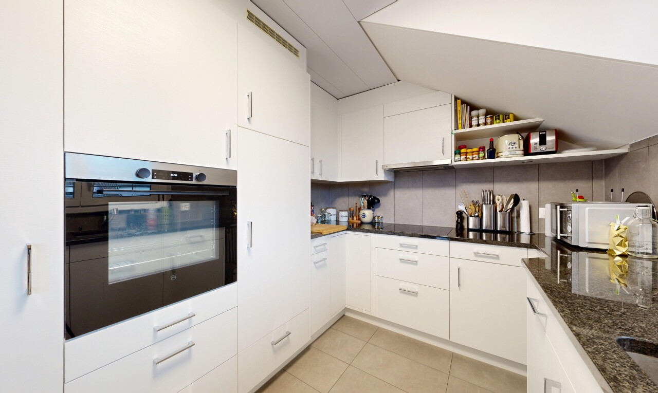 kitchen featuring oven, white cabinets, light tile patterned flooring, modern cabinets, and open shelves