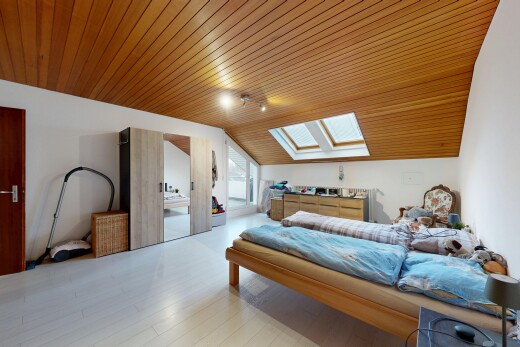 room / bedroom featuring a skylight, wooden ceiling, lofted ceiling, and wood finished floors