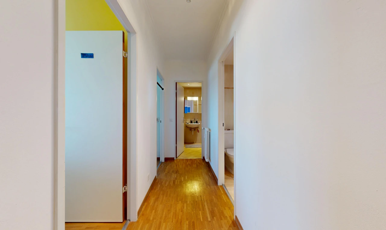 hall with light wood-type flooring