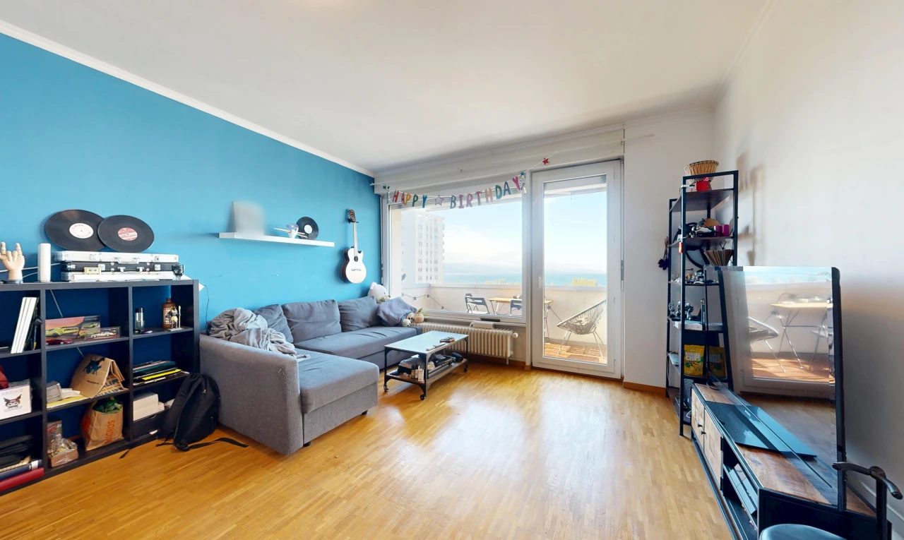 living room with access to outside, crown molding, light wood-style flooring, and radiator heating unit