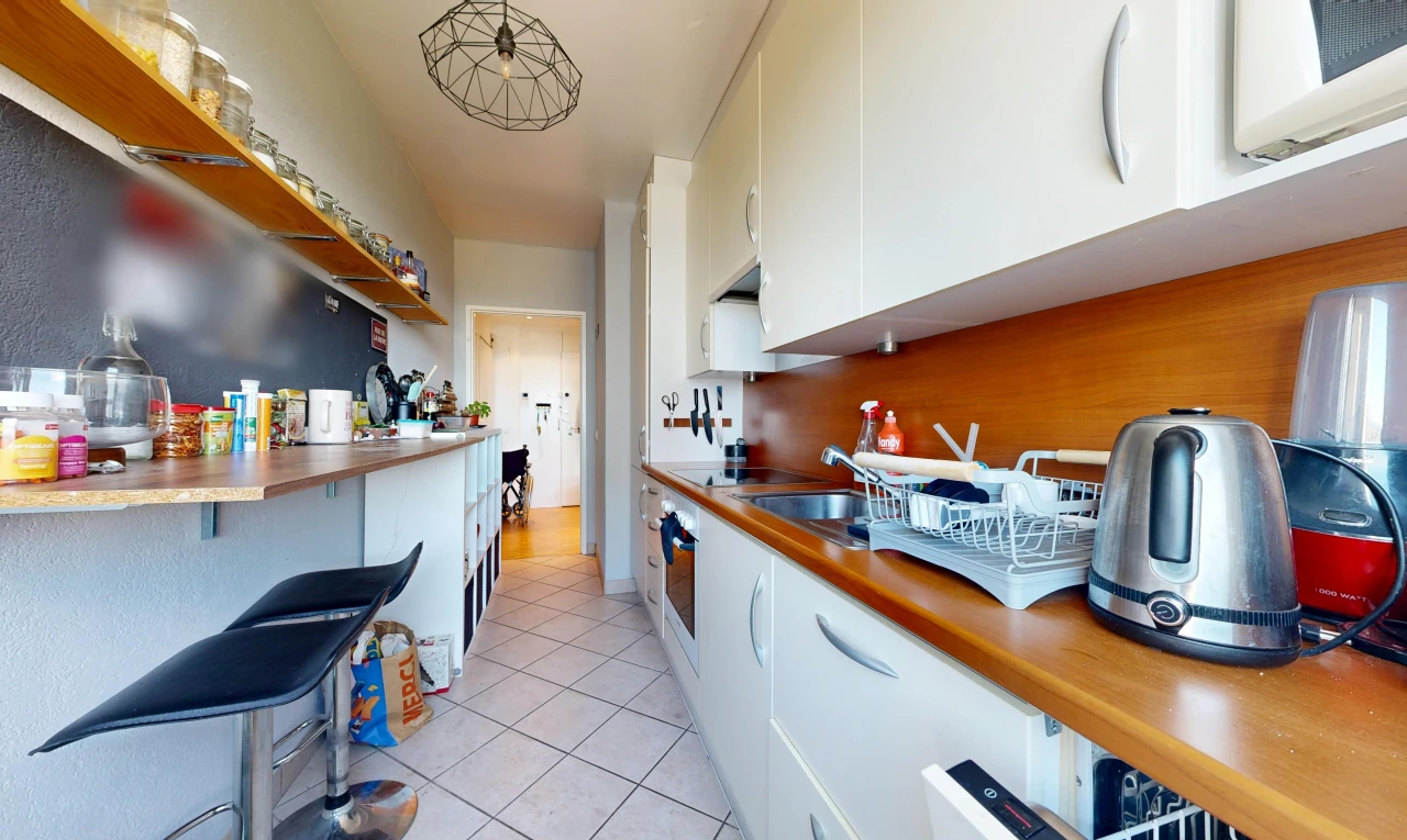 kitchen featuring white cabinets, light tile patterned floors, butcher block countertops, and wall oven