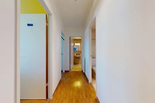 hall with light wood-type flooring