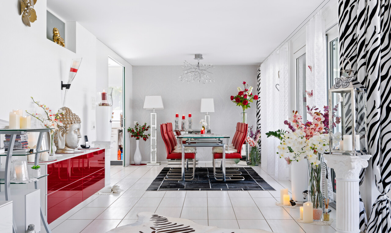 dining room with light tile patterned floors and hanging lights