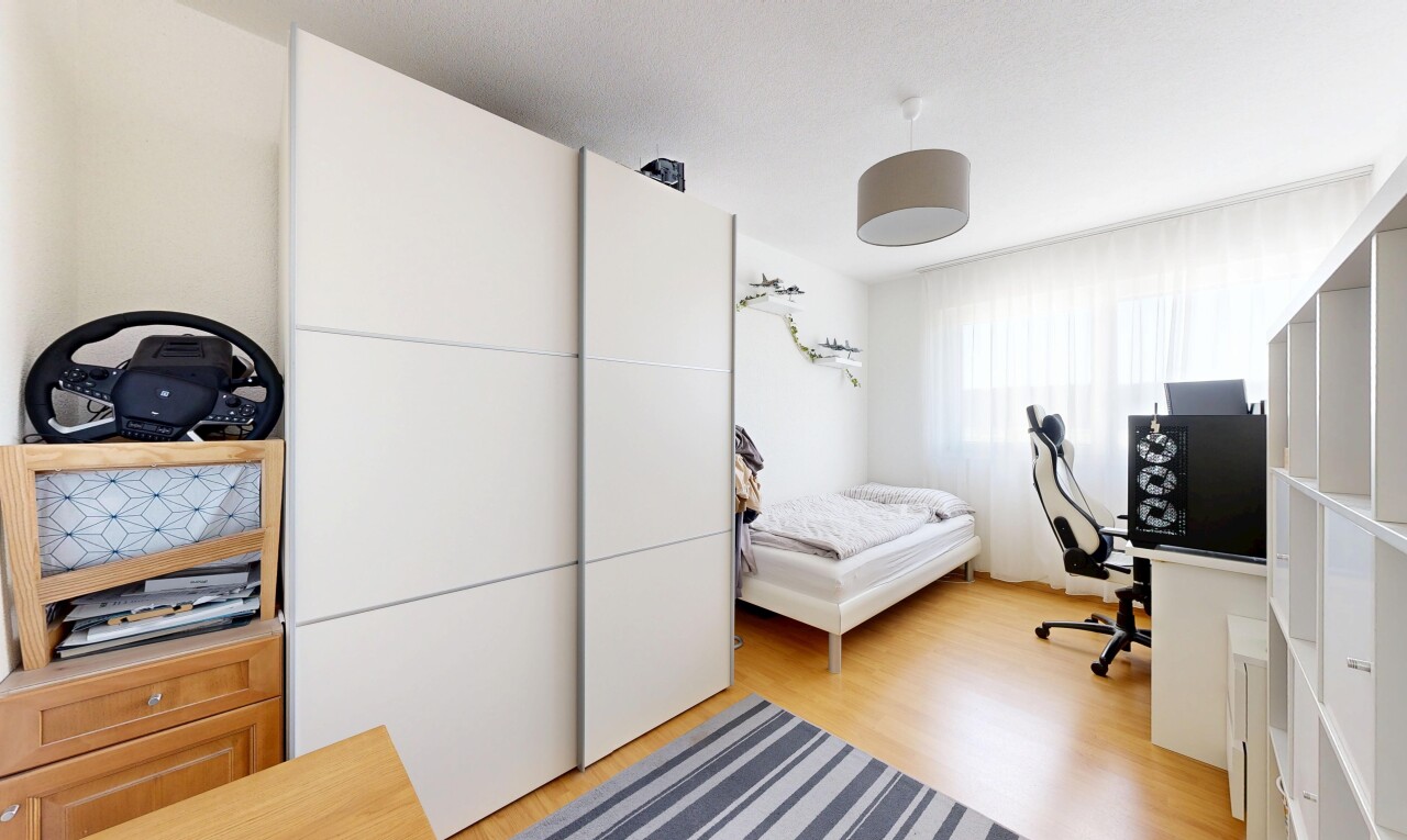 room featuring a desk and light wood-style flooring
