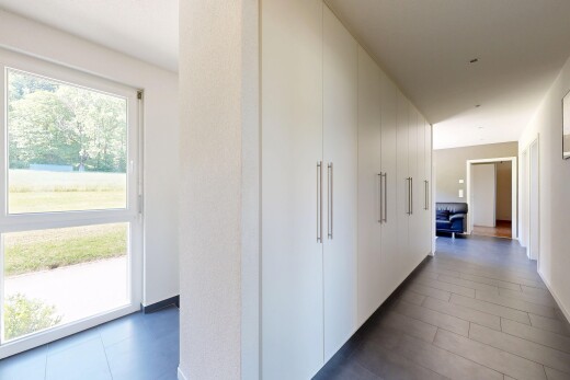 corridor with baseboards