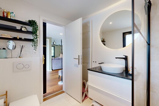 bathroom featuring vanity and recessed lighting