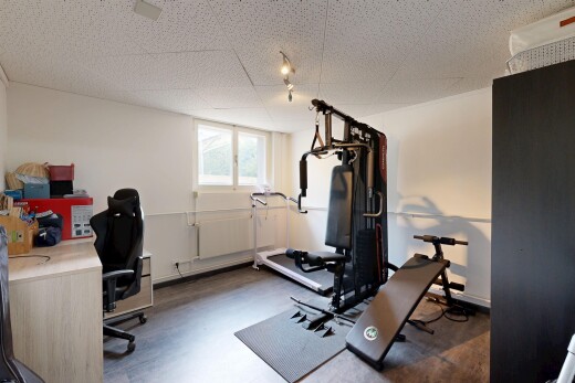 workout area featuring a desk