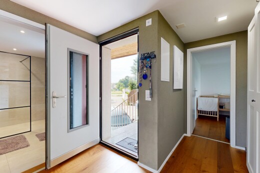 hallway featuring recessed lighting and wood finished floors