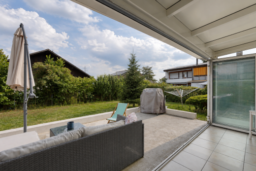 terrace with a patio and grilling area
