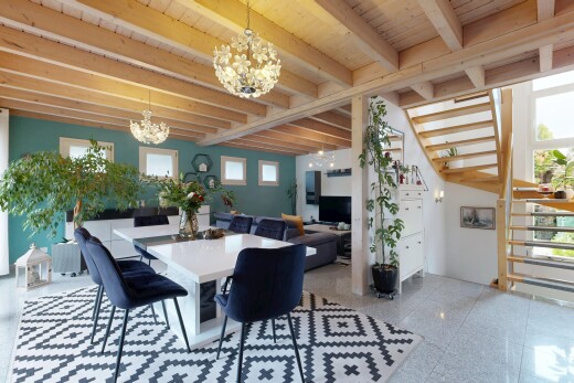 esszimmer mit treppen, balkendecke, beamed ceiling, natürliches licht, und high end ceiling