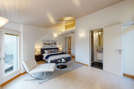 room / bedroom with attic access, access to outside, wood finished floors, and wooden ceiling