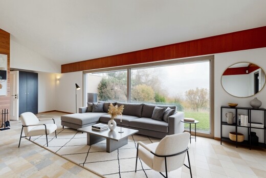 living room featuring vaulted ceiling