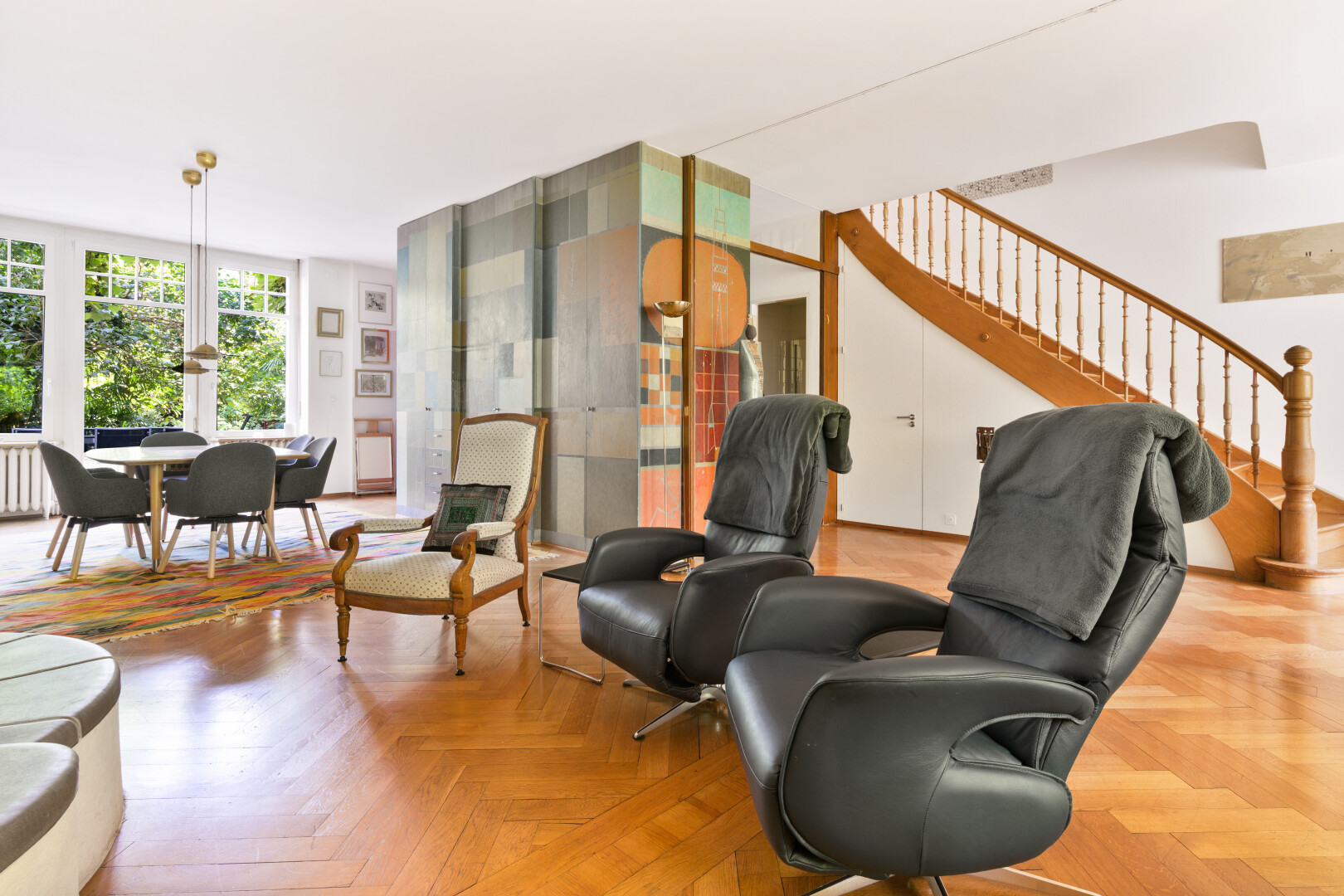 living area featuring stairs