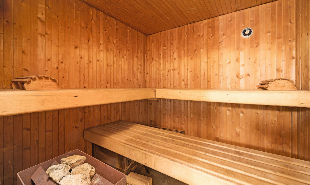 storage room with a sauna