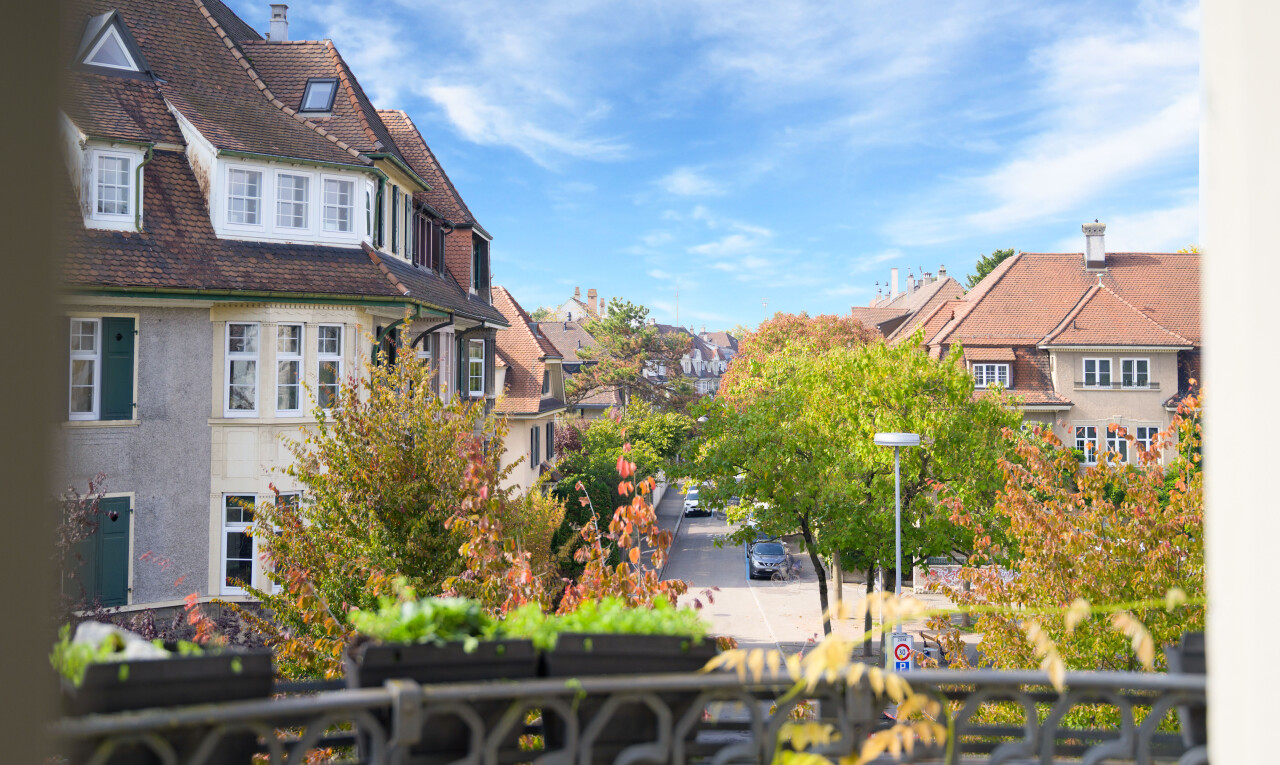 view of home with a residential view and a balcony