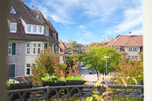 view of home with a residential view and a balcony