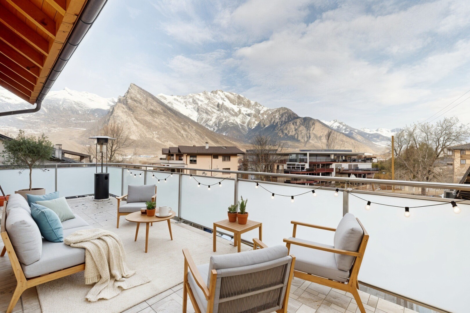 terrace featuring a patio and a mountain view