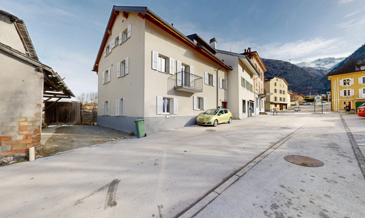 view of building exterior featuring a mountain view