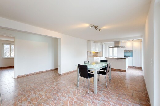dining space with stone finish flooring