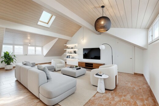 living area featuring plenty of natural light, a skylight, and wooden ceiling